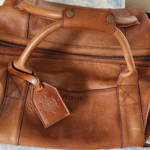 Tacova 12x12x12  52 liter leather duffle Never used.  limited edition -HONEY-